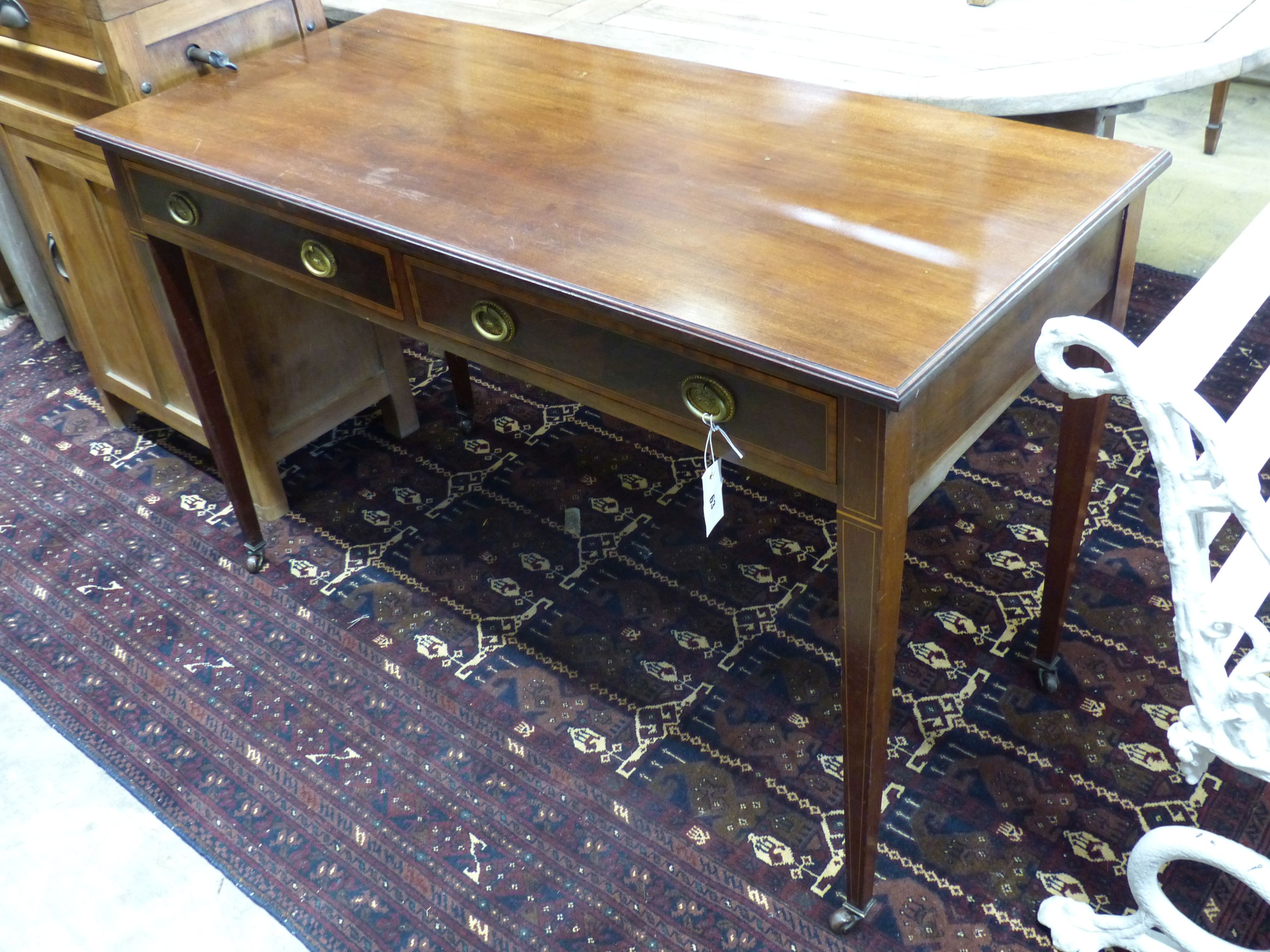 An Edwardian satinwood banded mahogany two drawer side table, width 122cm, depth 54cm, height 76cm